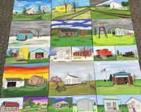 Photo of numerous paintings of buildings