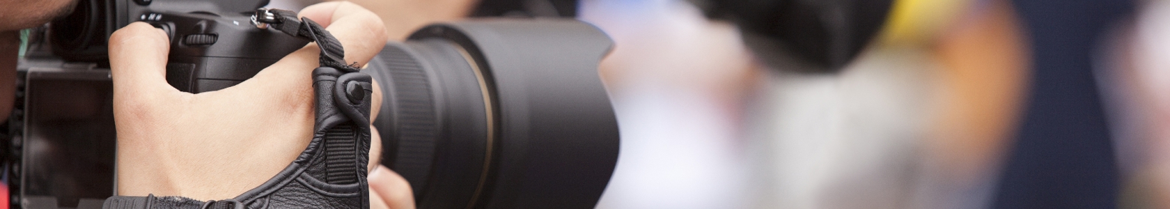 Photo of people using cameras