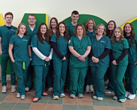 A group photo of the 13 nursing students in the Spring 2025 co-hort.
