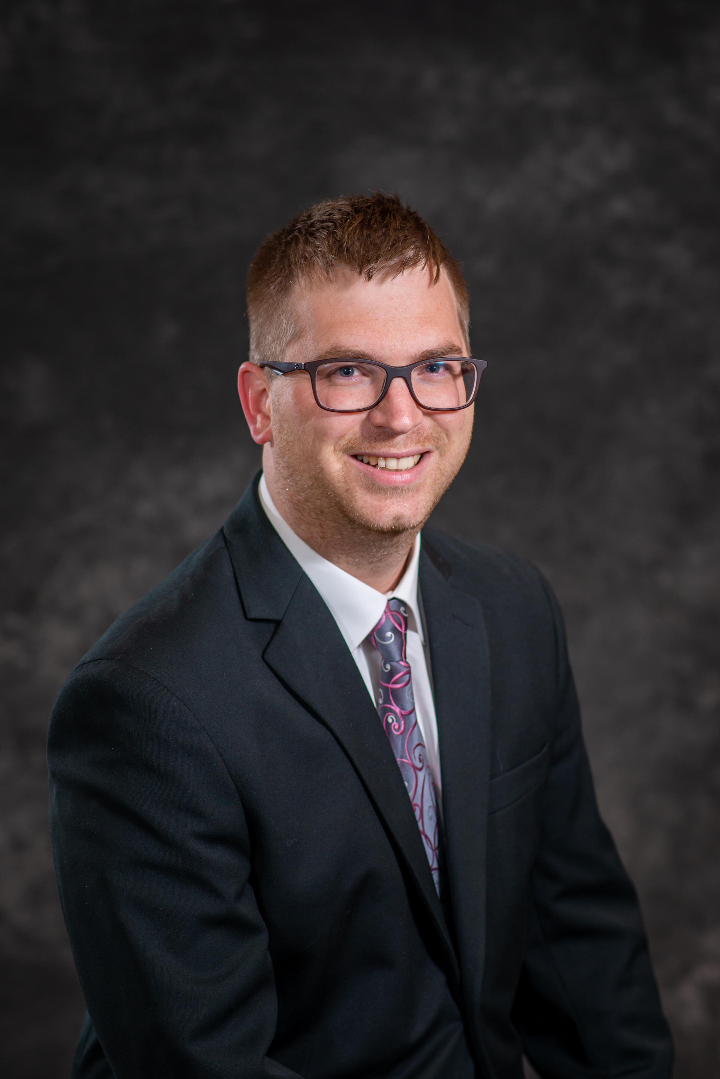 A posed photo of Board Treasurer Joshua Stump.