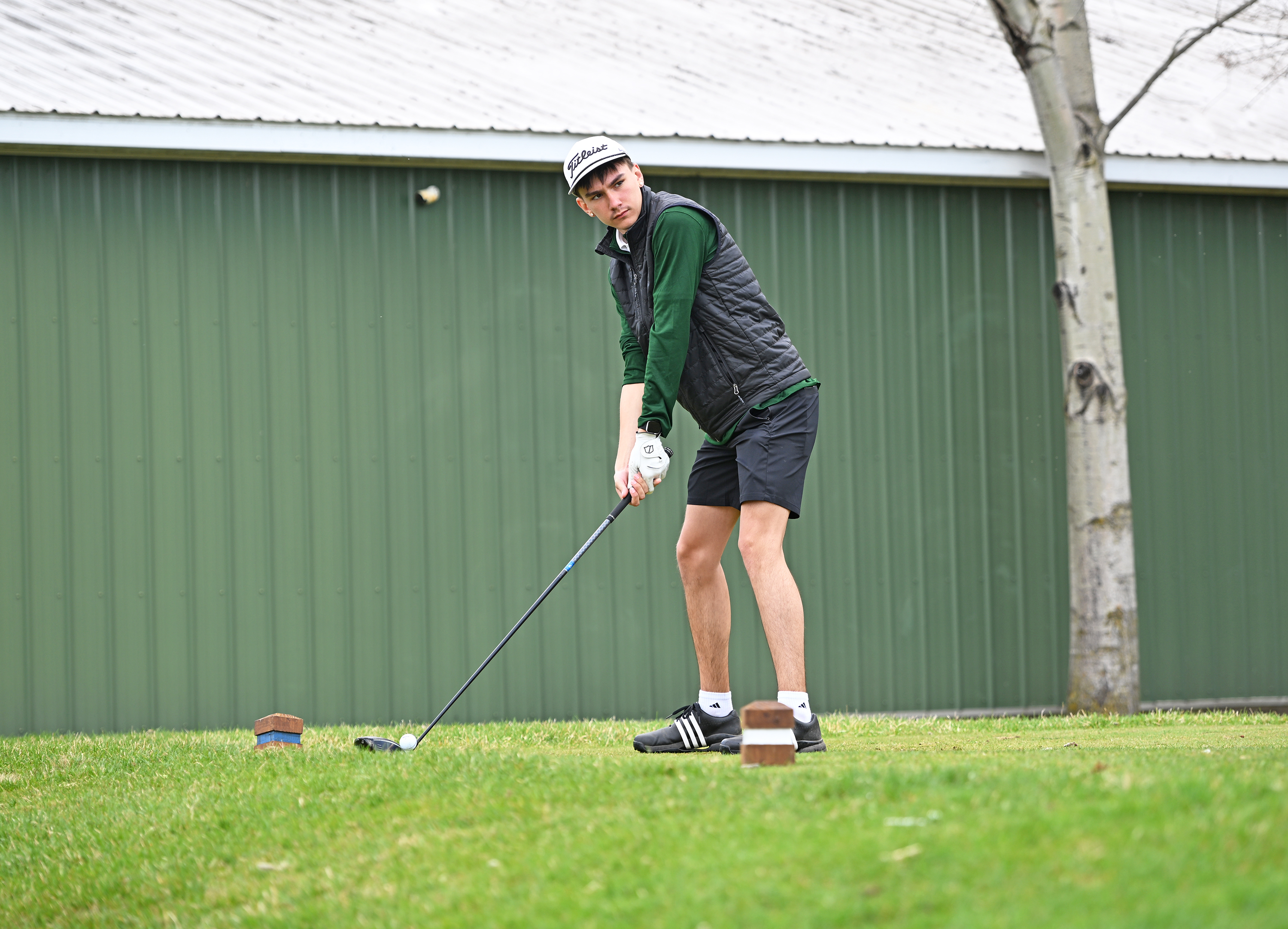 MCC golfer Mason Blair preparing to tee off.