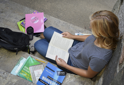 Early College Student reading her book