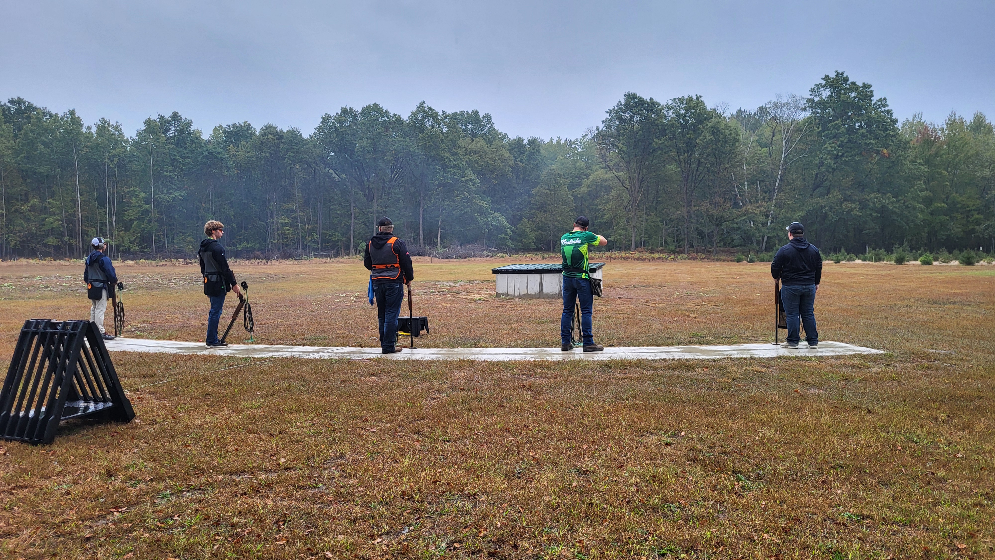 MCC clay target team lined up preparing to shoot at a competition. 