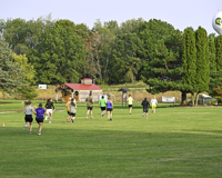 Runners taking off from the start line during the 10th annual Bramble Ramble 5K Trail Run/Walk and 7th Annual Mike Seaman Memorial 10K Run